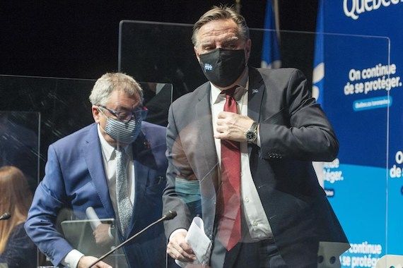 Le premier ministre du Québec, François Legault, et le directeur national de santé publique, le Dr Horacio Arruda